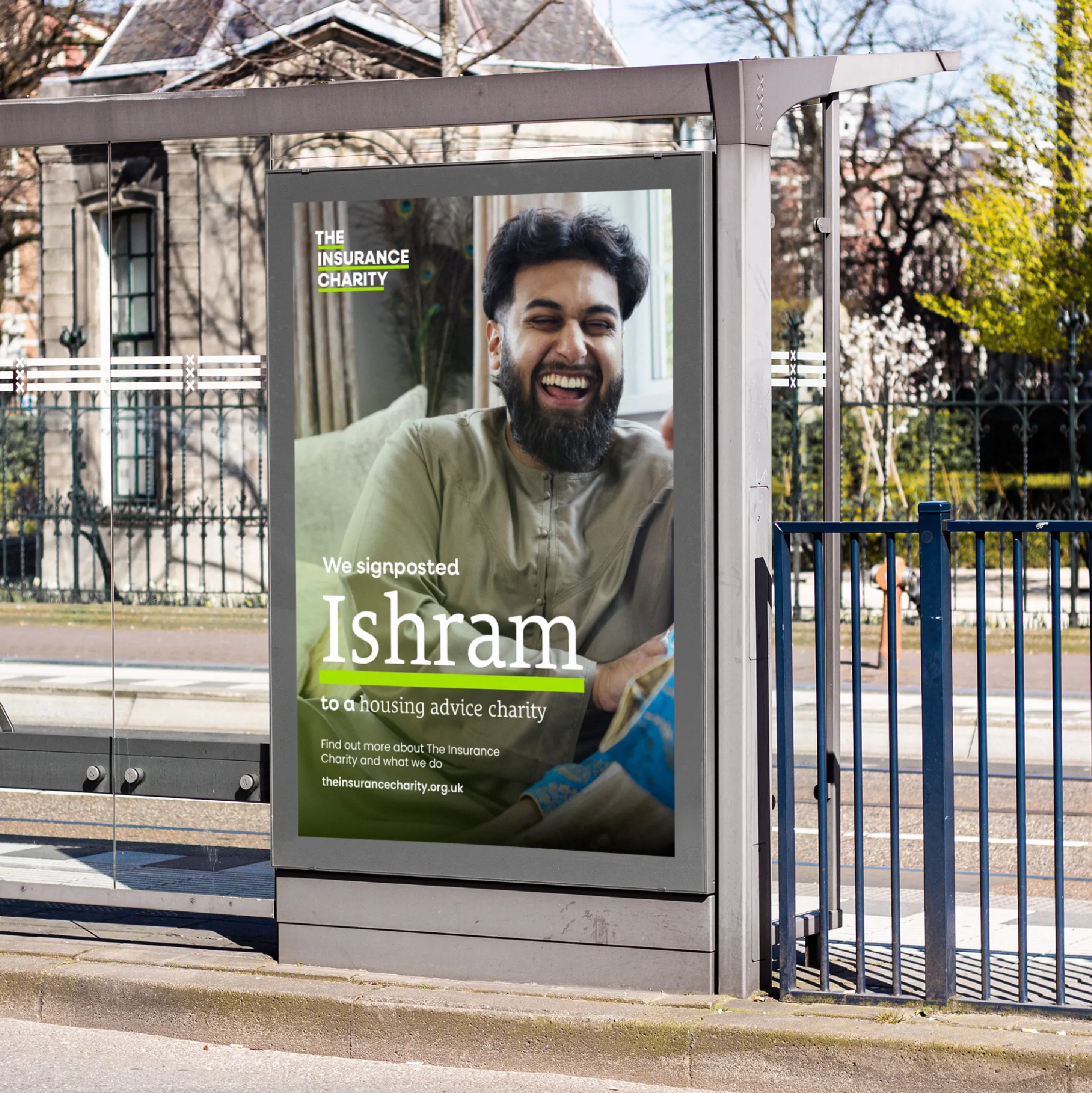 Bus stop advertisement showing a man with the text 'We signposted Ishram to a housing advice charity'