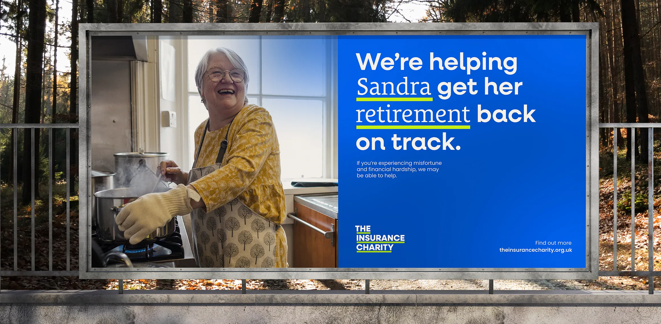 Billboard shows a woman on the left and text on the right on a blue background saying 'We're helping Sandra get her retirement back on track'